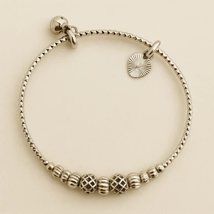 دستبند استیل و طلایی مهره‌ای با آویز قلب