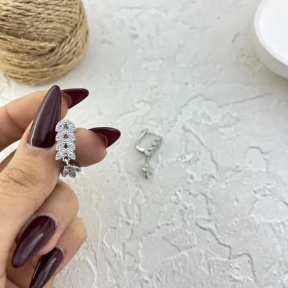 نیم ست زنانه مدل لیفورا طرح جواهر برگ با نگین‌های درخشان (گردنبند، دستبند و گوشواره)