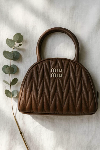 کیف پاسپورتی میومیو