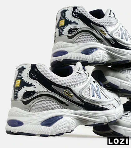 کفش کتانی مردانه و زنانه سفید سرمه ای NEW BALANCE 1064 V.2