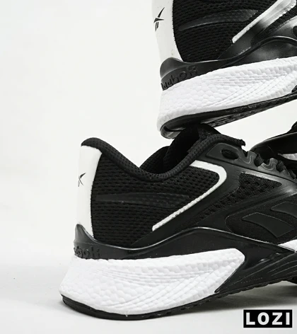 کفش کتانی مشکی سفید REEBOK Speed 21 TR