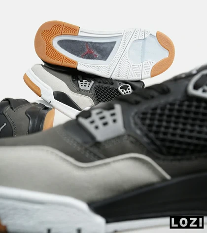 کتانی ساق‌دار بزرگ پا مشکی طوسی Nike air jordan 4 مدل 7381