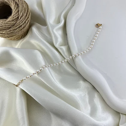 دستبند زنانه مروارید ژوپینگ مدل درخشیدگی