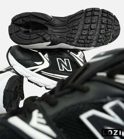 کفش کتانی مردانه و زنانه مشکی سفید NEW BALANCE 530