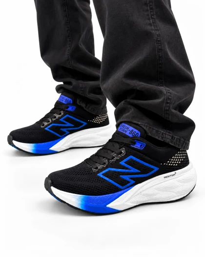 کفش کتانی رانینگ مردانه نیوبالانس زیره بست مشکی آبی New BALANCE