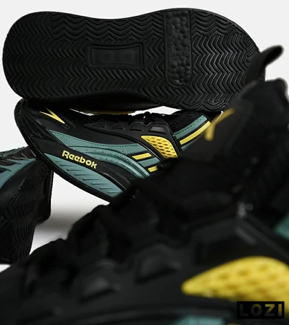 کفش کتانی ساق‌دار مشکی فیلی زرد Reebok Shaq Attaq
