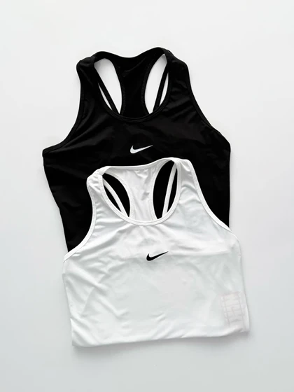 تاپ ورزشی زنانه فلامنت پشت بندی مینیمال نایکی Nike