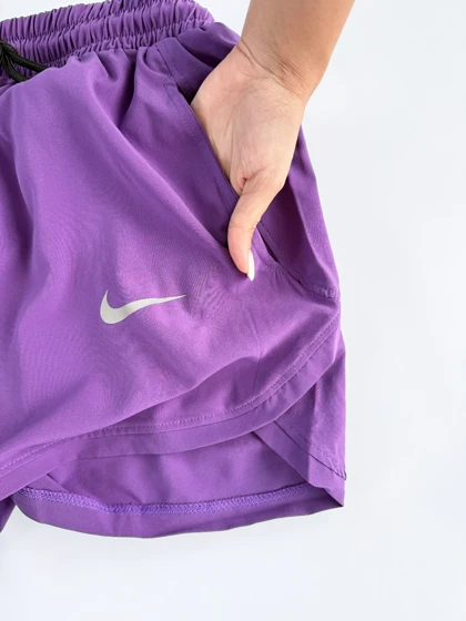 شورتک ورزشی بغل هلال جیب‌دار نایکی Nike