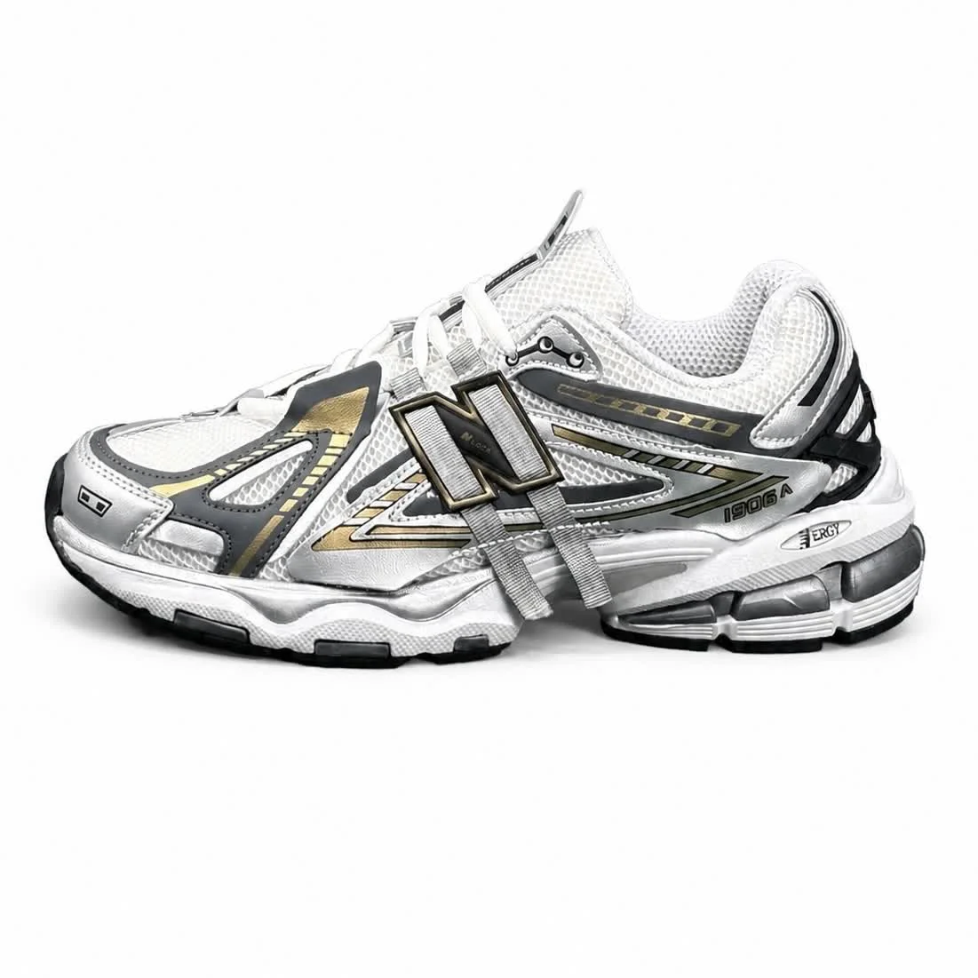 کتانی مردانه نیوبالانس 1906 طوسی مشکی طلایی New BALANCE 1906A