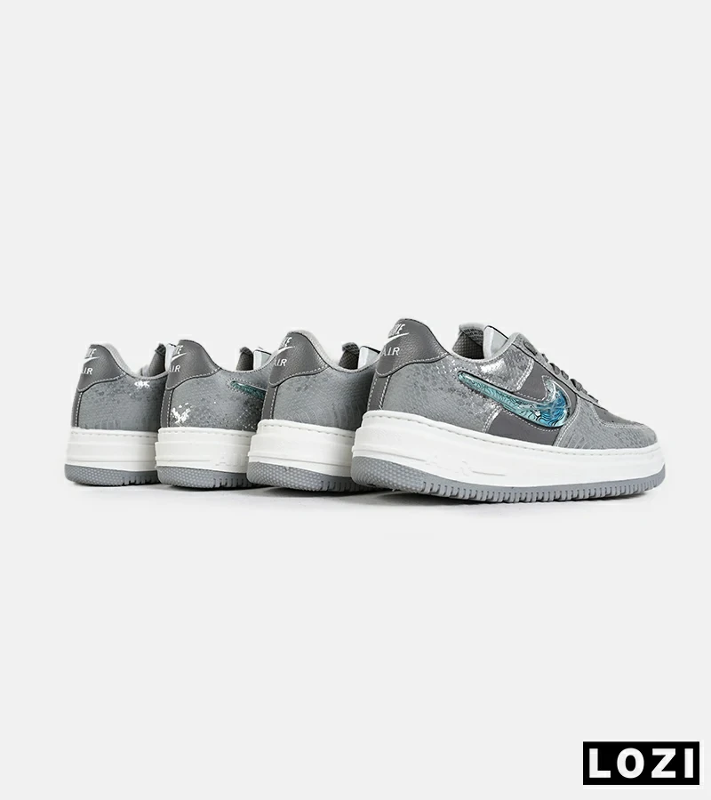 کفش کتانی مردانه و زنانه طوسی آبی NIKE dunk low steam puppet مدل 7220