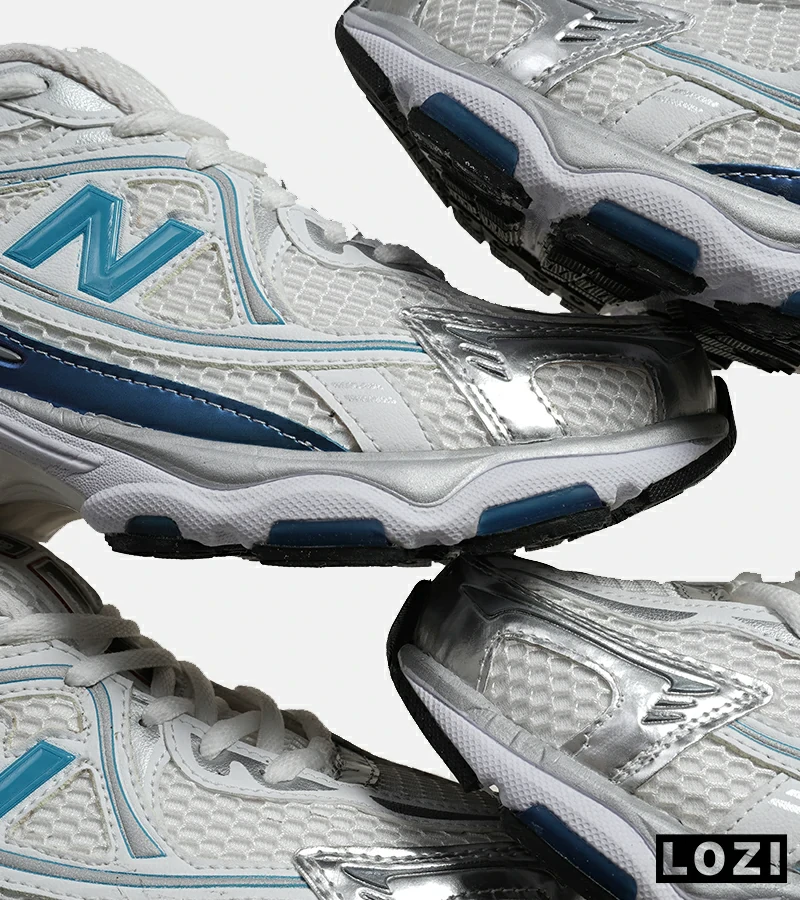 کفش کتانی مردانه و زنانه سفید طوسی آبی NEW BALANCE 1064 مدل 6312