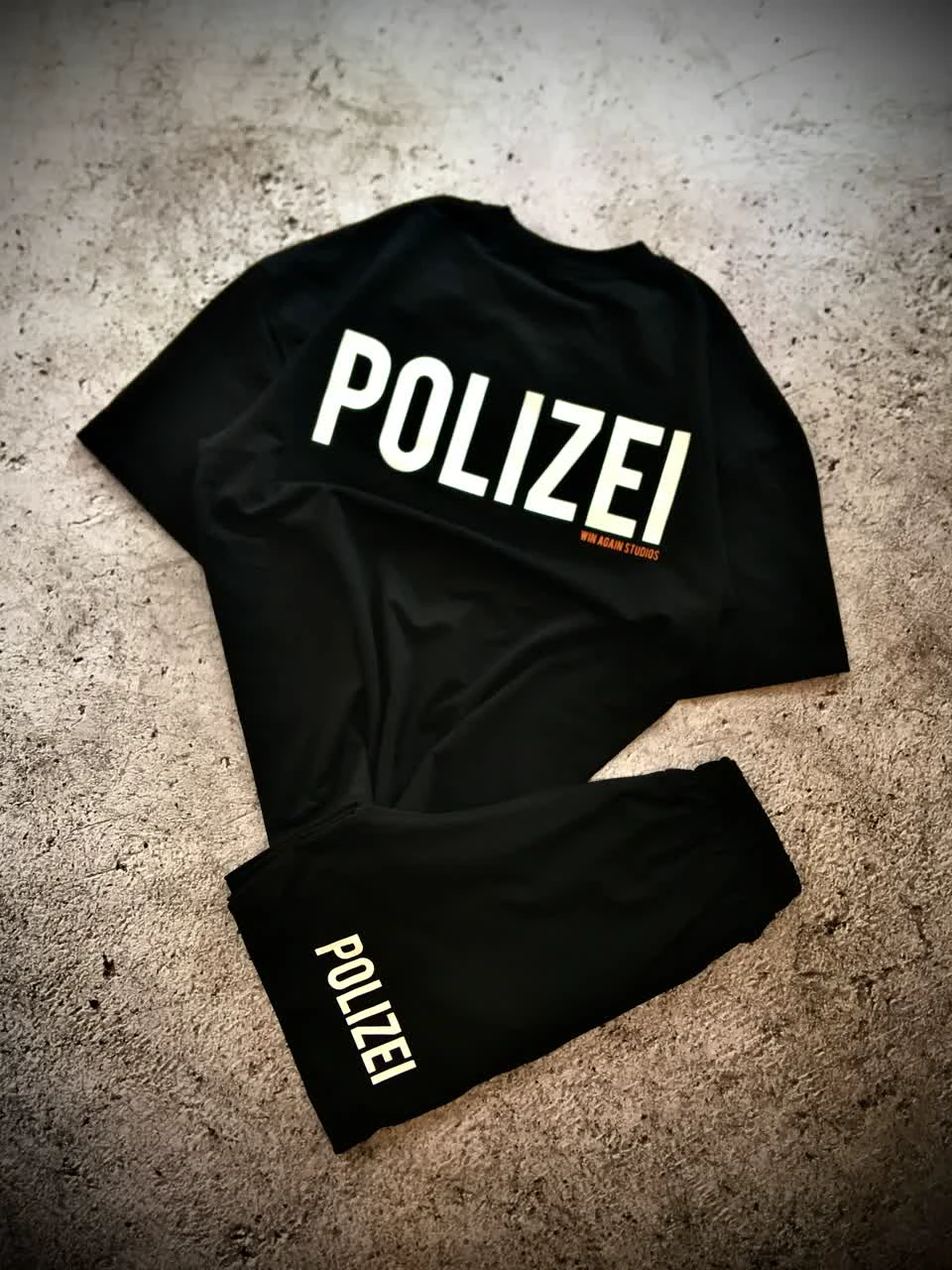 ست تیشرت شلوارک نیم بگ باکسی دونخ مدل POLIZEI _ مشکی