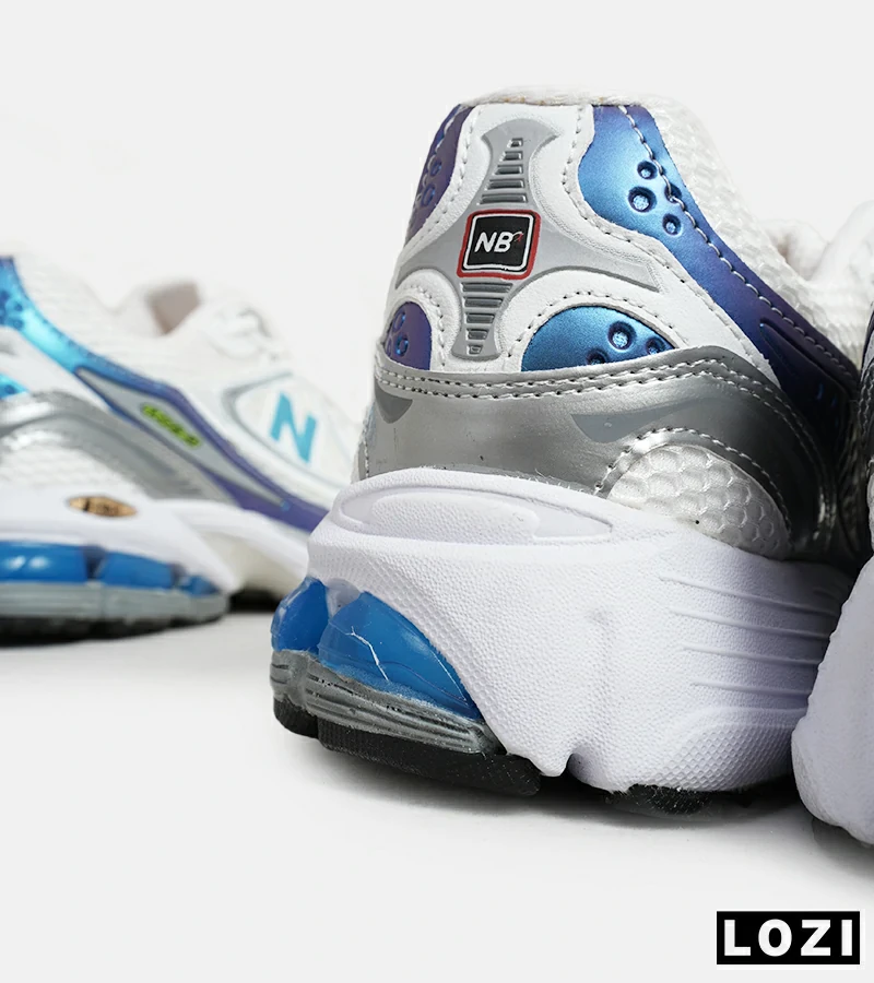 کفش کتانی مردانه و زنانه سفید طوسی آبی NEW BALANCE 1064 مدل 6312