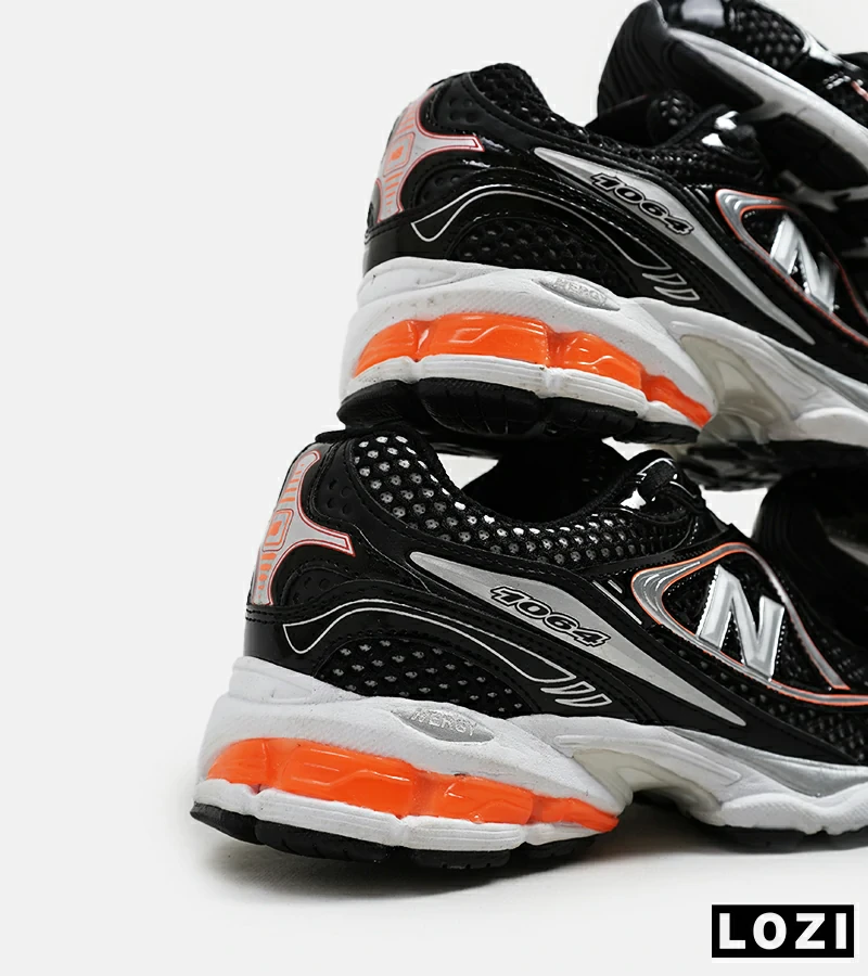 کفش کتانی مردانه و زنانه مشکی نارنجی NEW BALANCE 1064 مدل 5627