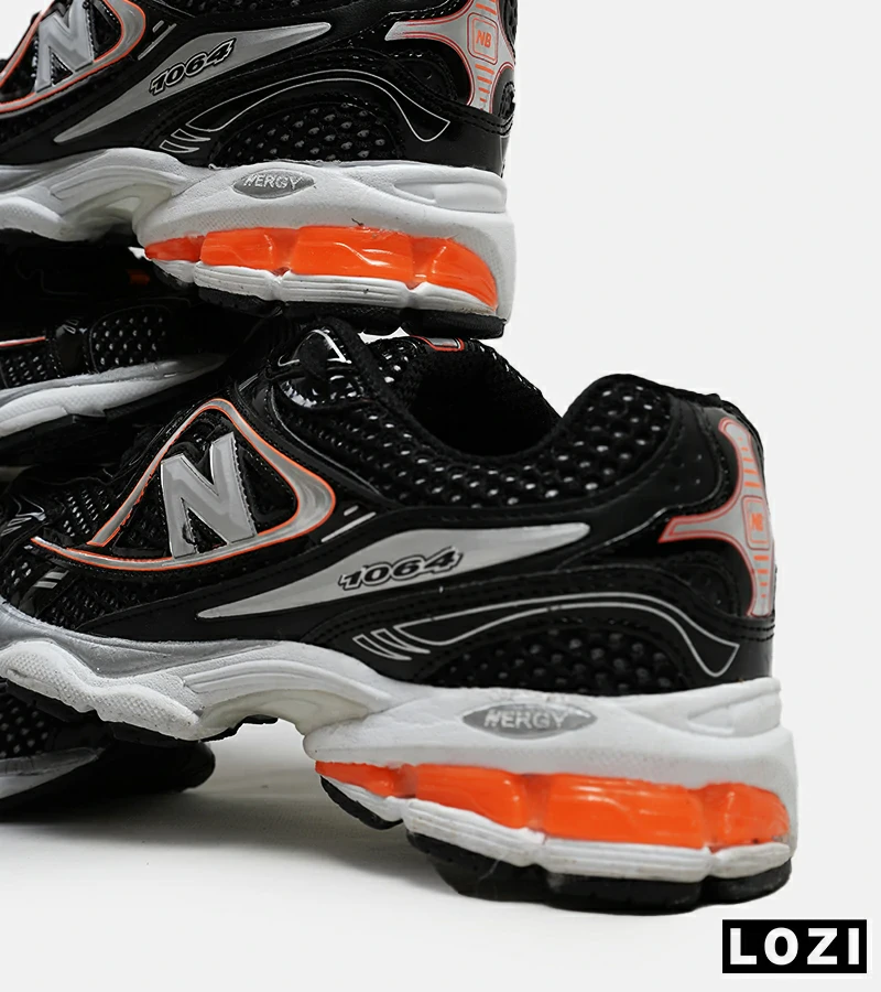 کفش کتانی مردانه و زنانه مشکی نارنجی NEW BALANCE 1064 مدل 5627