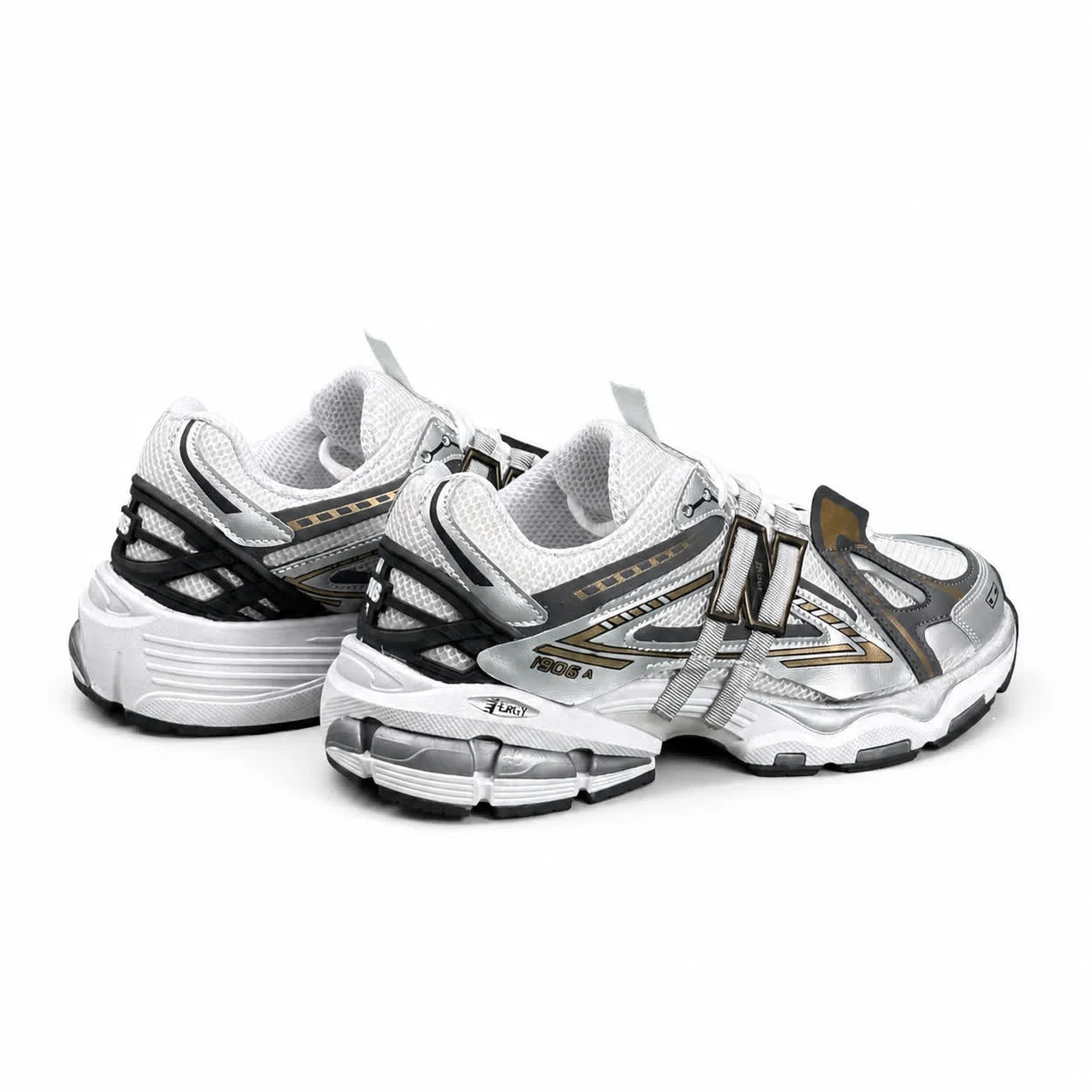 کتانی مردانه نیوبالانس 1906 طوسی مشکی طلایی New BALANCE 1906A