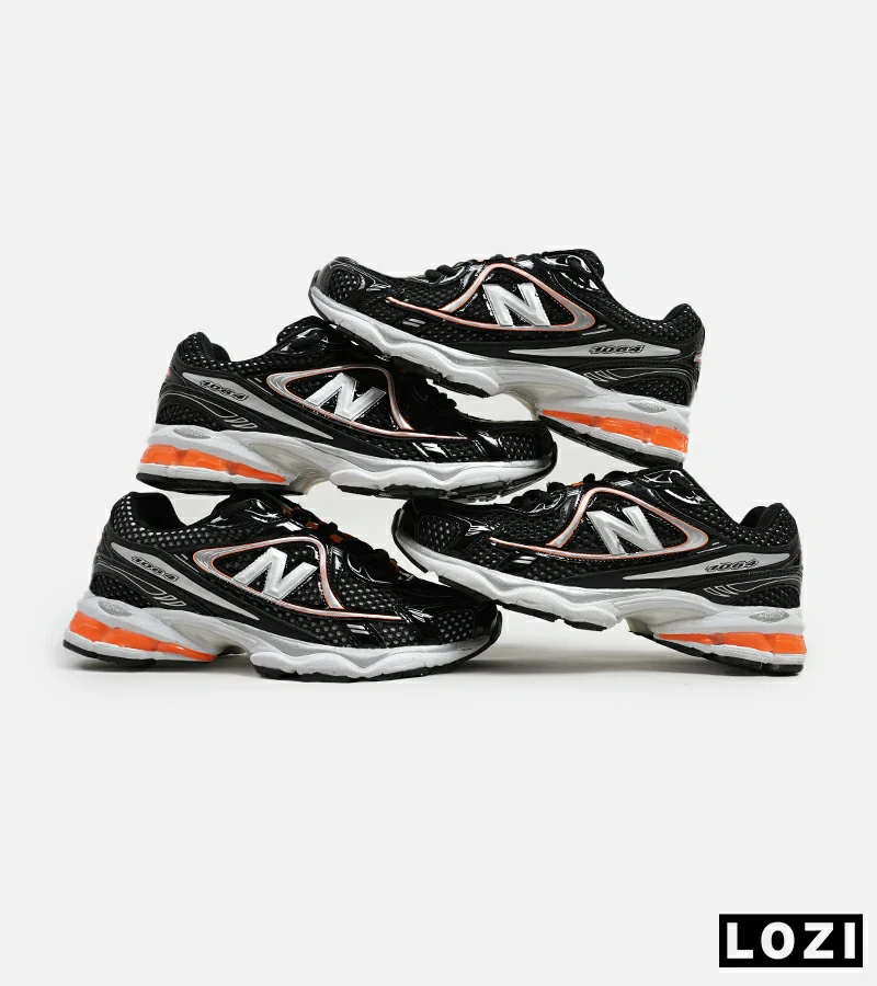 کفش کتانی مردانه و زنانه مشکی نارنجی NEW BALANCE 1064 مدل 5627