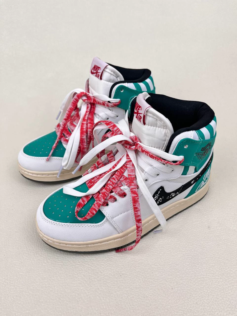 کتانی ونس زنانه ساق‌دار ایر جردن 1 مدل کریسمس 1 NIKE AIR JORDAN کد 912