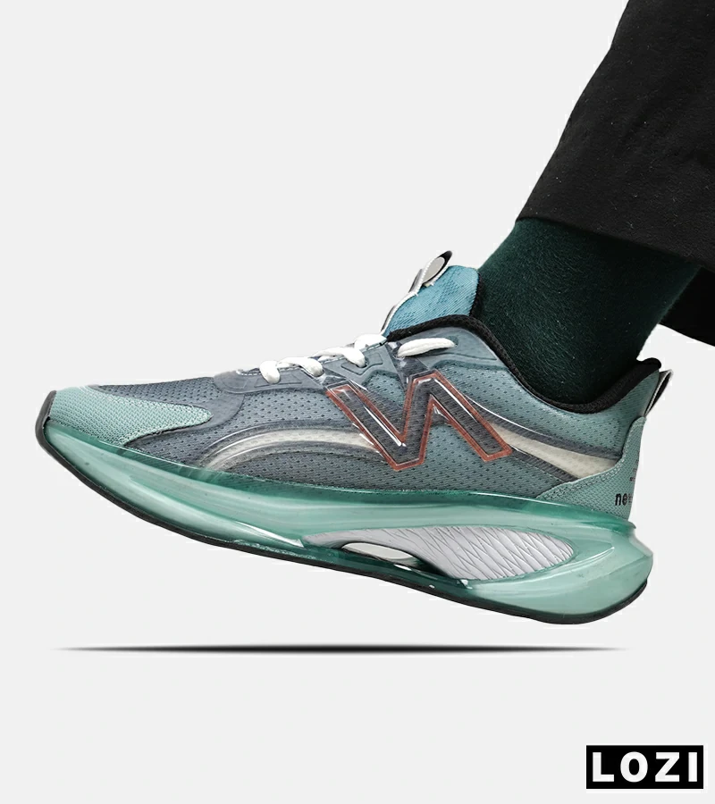 کفش کتانی مردانه و زنانه طوسی سبز NEW BALANCE More Trail v3 مدل 5240