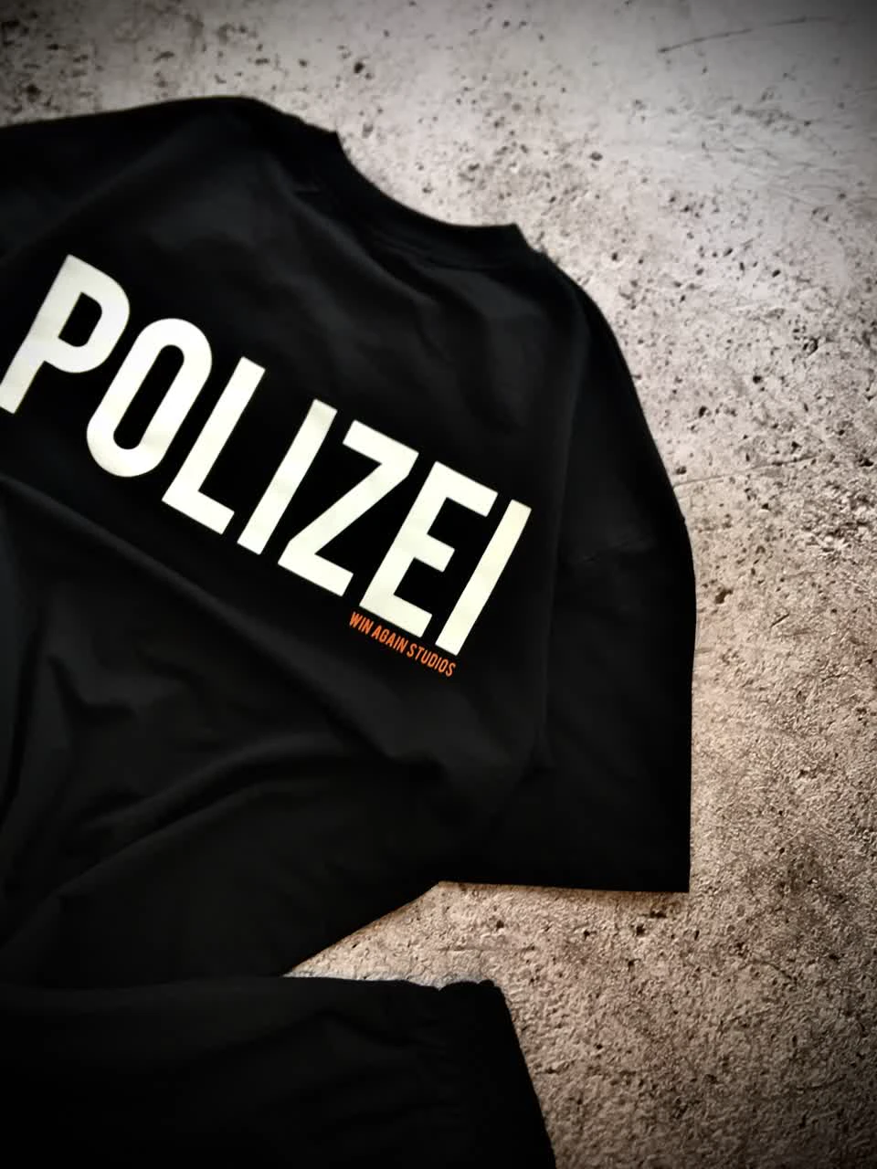 ست تیشرت شلوارک نیم بگ باکسی دونخ مدل POLIZEI _ مشکی